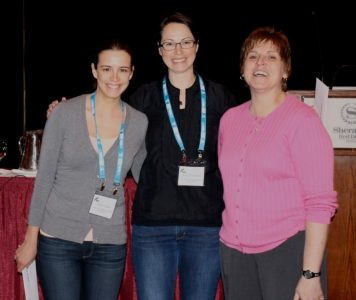 Katy and Gosia pose with University of Calgary's Dr. Lorraine Doepel